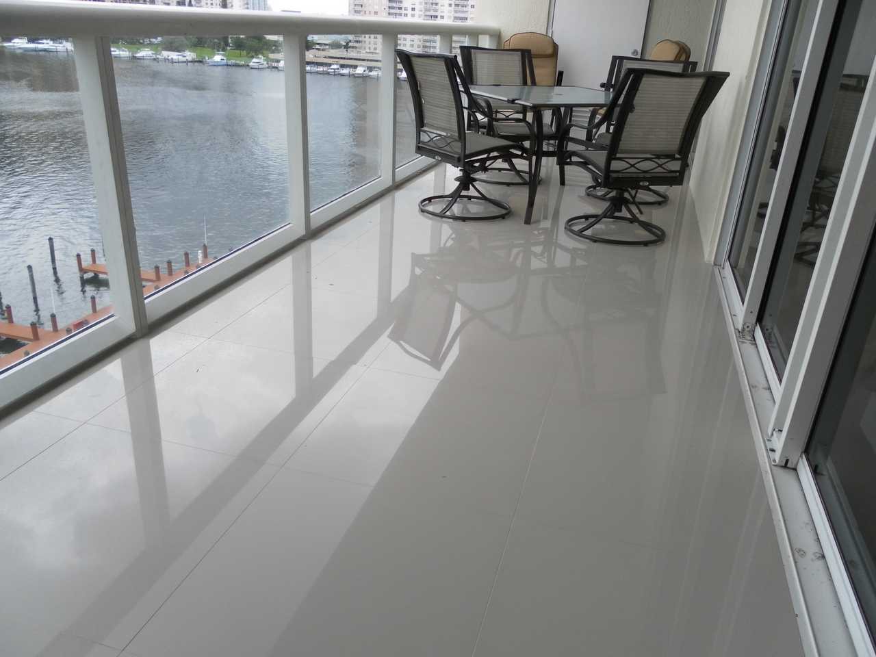 Balcony tile flooring remodel Miami Beach – waterfront condo renovation